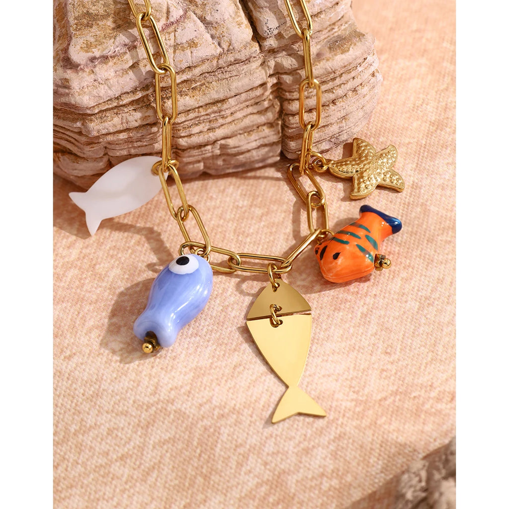 YACHAN Ocean Charms Stainless Steel Bracelet for Women Individual Ceramic Fish Pendants 18K Gold Plated Waterproof Jewelry