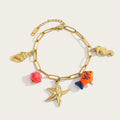 YACHAN Trendy 18K Gold Plated Stainless Steel Charms Chain Bracelet for Women Ocean Beach Vacation Waterproof Jewelry