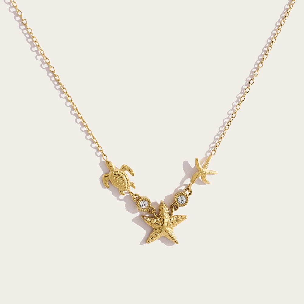 YACHAN Waterproof 18K Gold Plated Stainless Steel Ocean Beach Pendant Necklace for Women Turtle Starfish Charm Jewelry