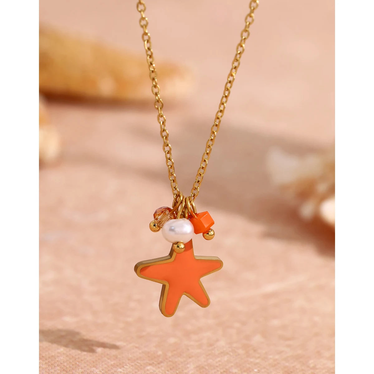 YACHAN 18K Gold Plated Stainless Steel Pendant Necklace for Women Chic Orange Star Charms Trendy Tarnish Free Waterproof Jewelry
