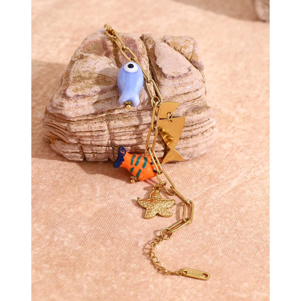 YACHAN Ocean Charms Stainless Steel Bracelet for Women Individual Ceramic Fish Pendants 18K Gold Plated Waterproof Jewelry